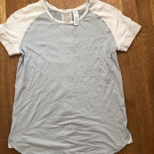 grey and white ivivva shirt